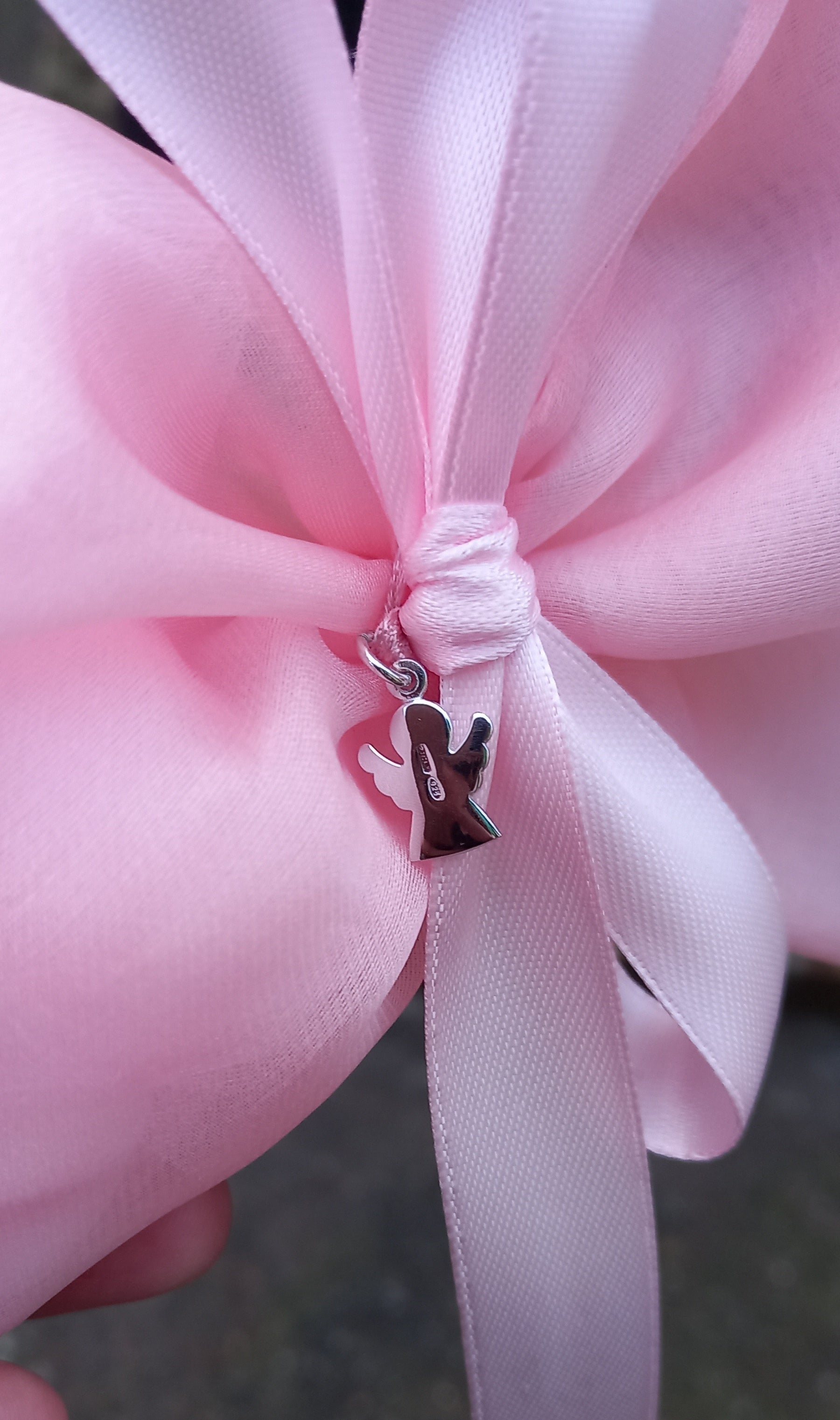 Dettaglio angelo argento su bomboniera